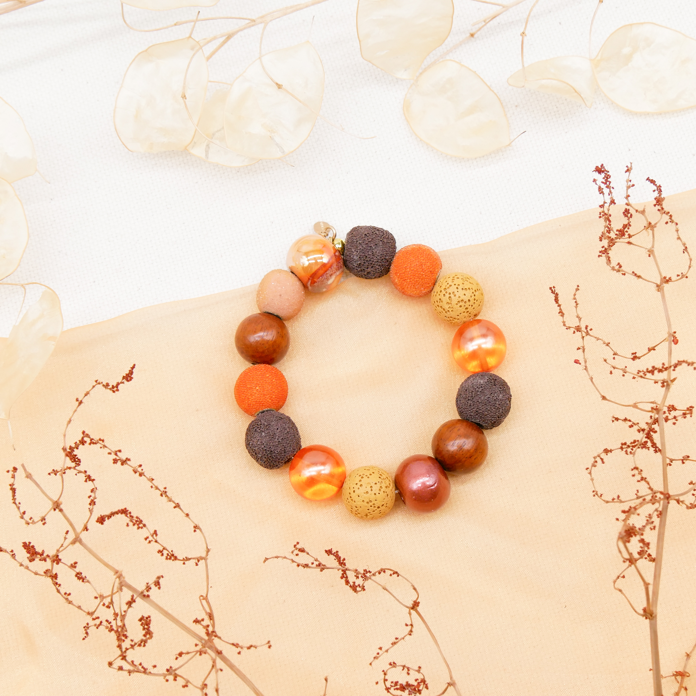 Armband auf Gummi zu "Bollywood", braun-orange