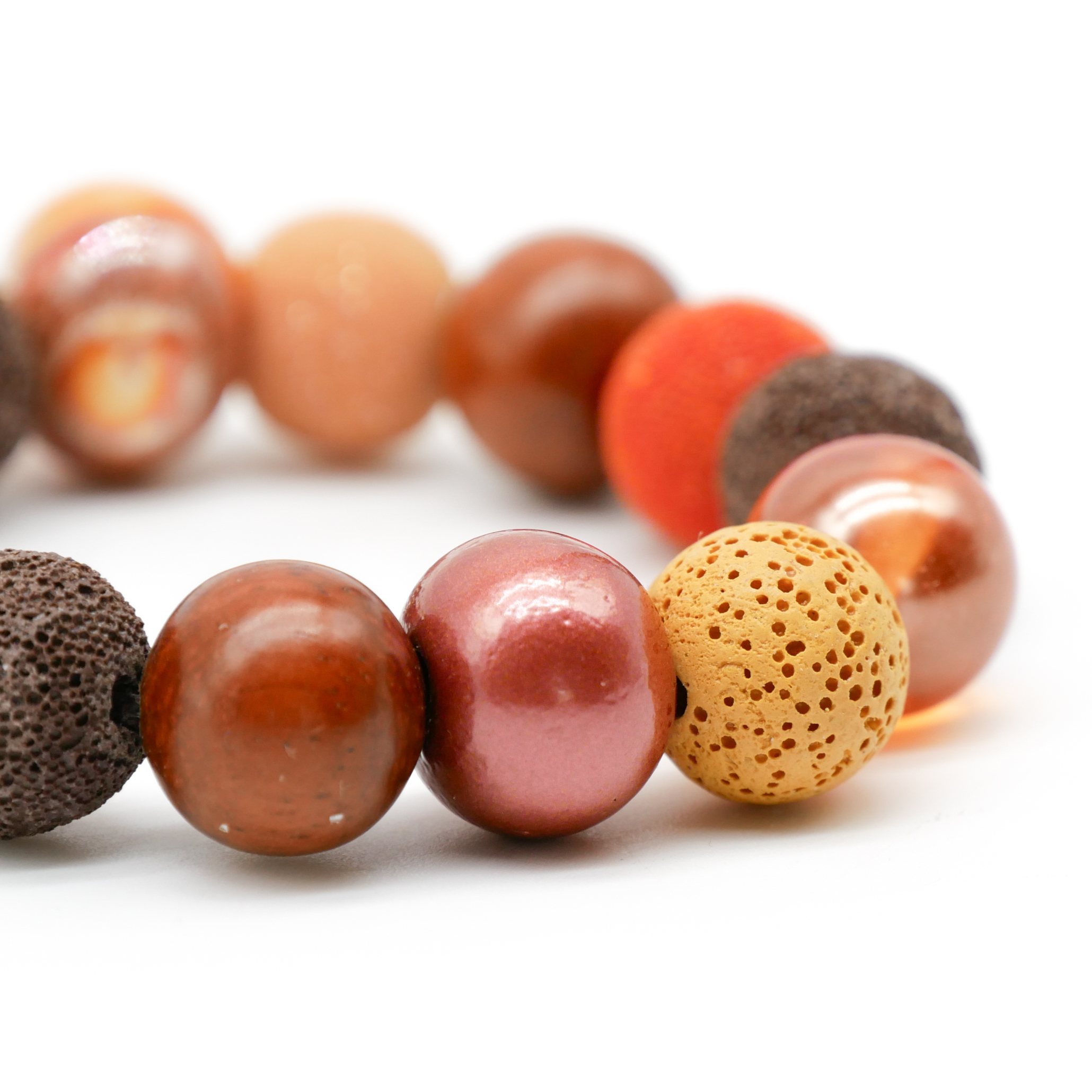 Armband auf Gummi zu "Bollywood", braun-orange