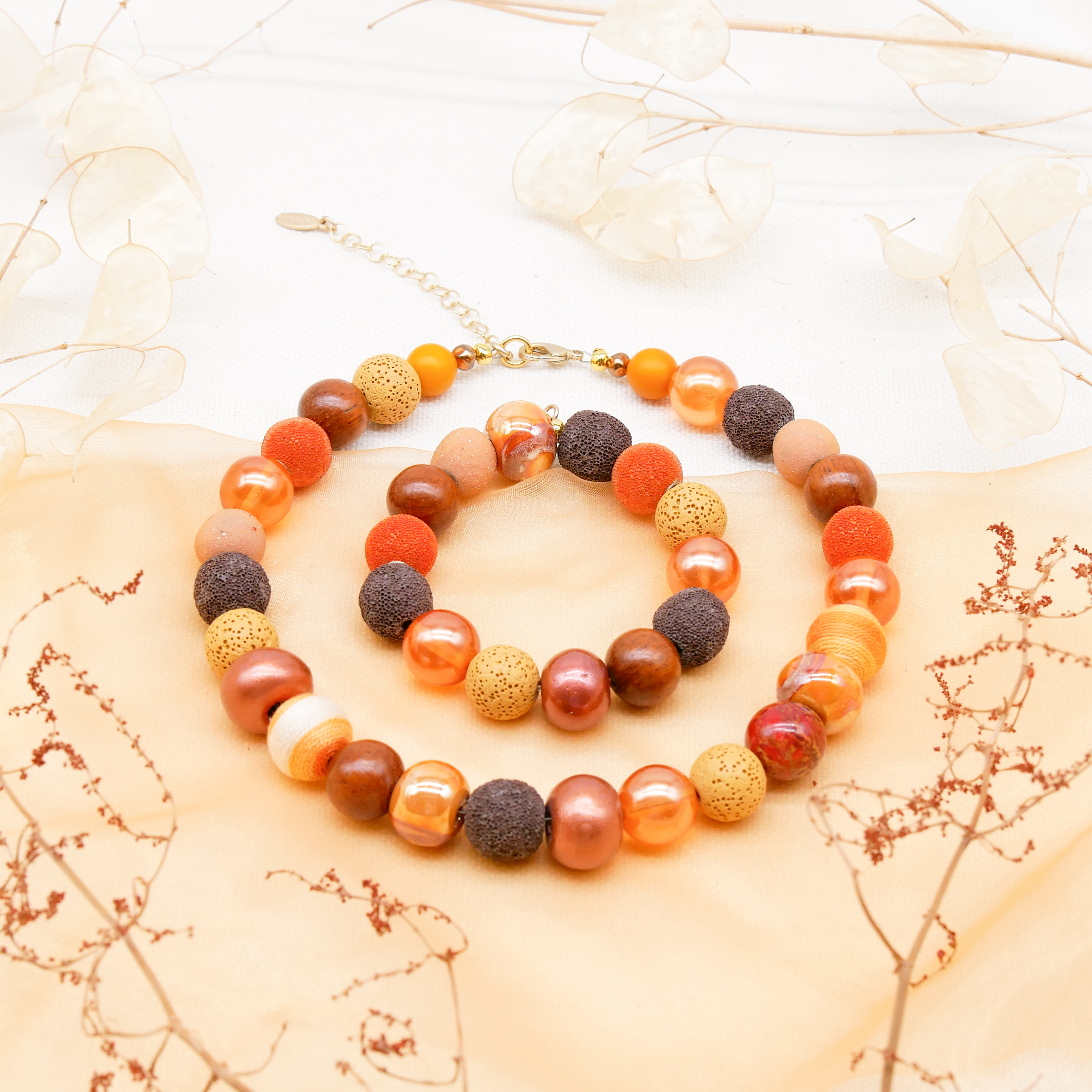 Armband auf Gummi zu "Bollywood", braun-orange