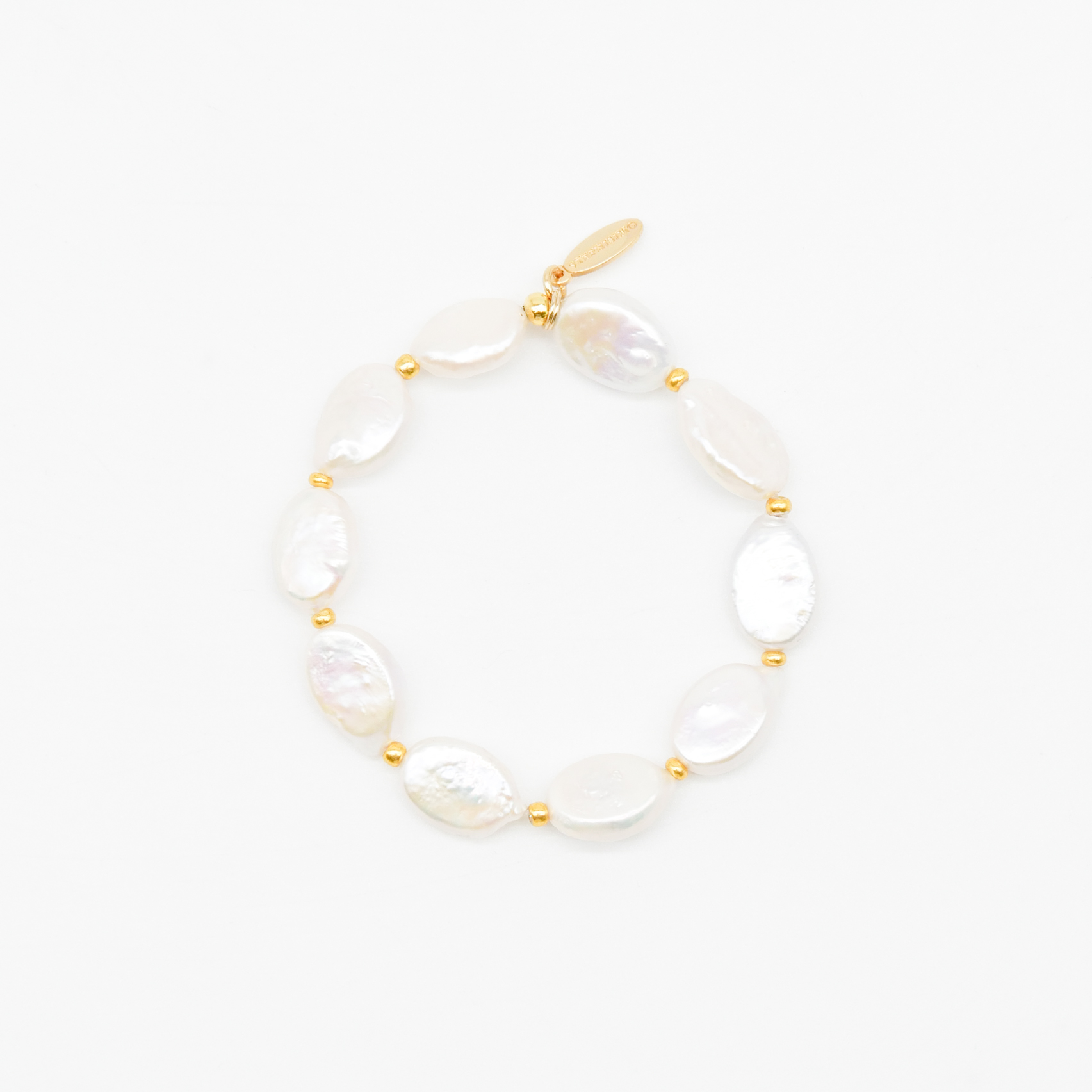 "Freshwater Pearls" - Armband auf Gummi, SWZ oval ca. 16 x 11 mm und goldfarbene Perlen