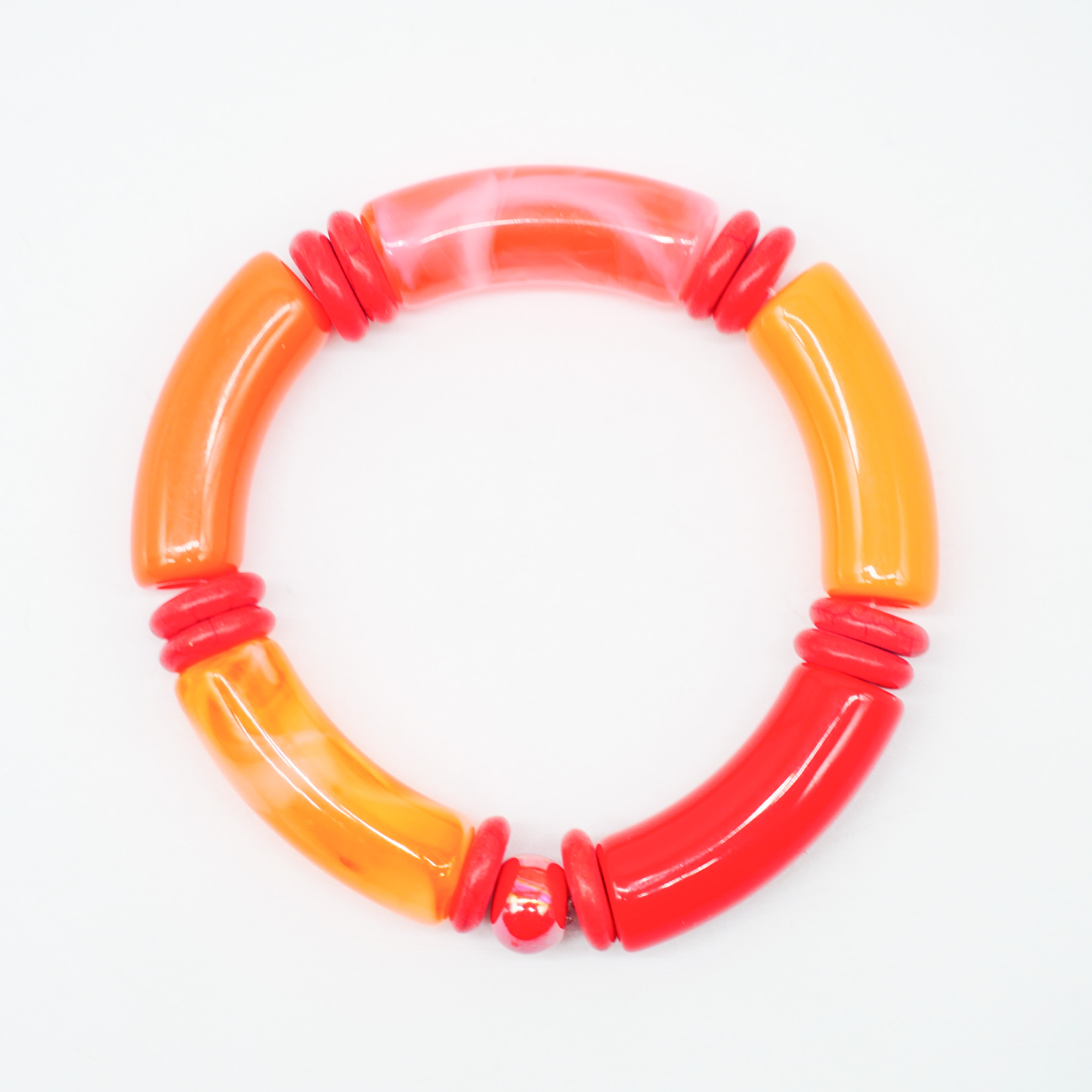 Armband "Tube" auf Gummi, gebogene Kunststoffelemente + Howite, orange