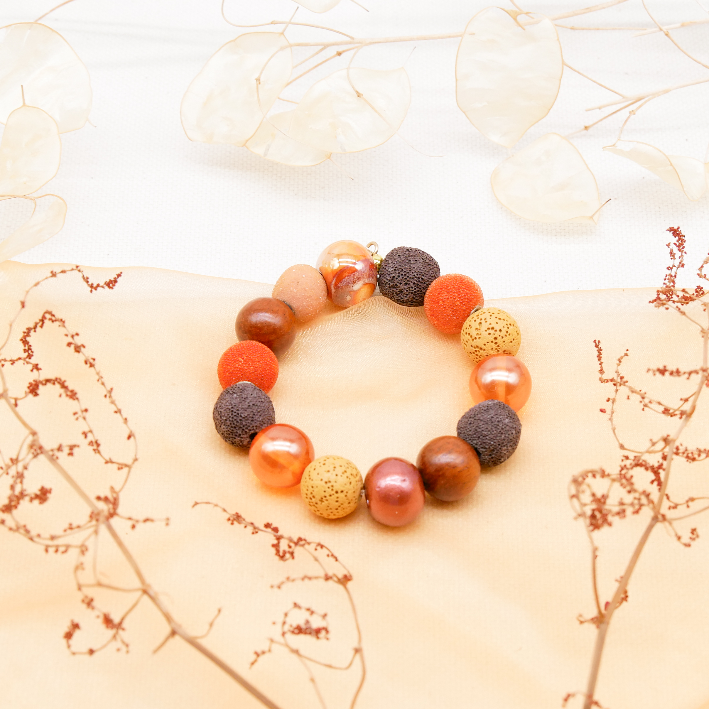 Armband auf Gummi zu "Bollywood", braun-orange